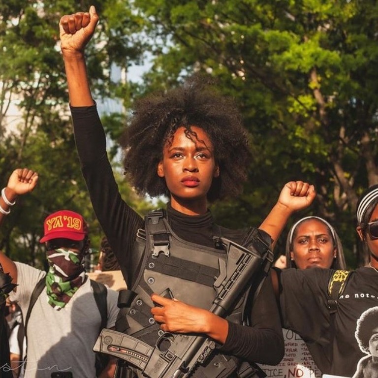 Novos Panteras Negras marcham armados em Atlanta, na Geórgia, EUA 3 6