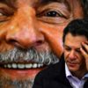 A imagem mostra Fernando Haddad cabisbaixo e um Lula atrás sorridente.